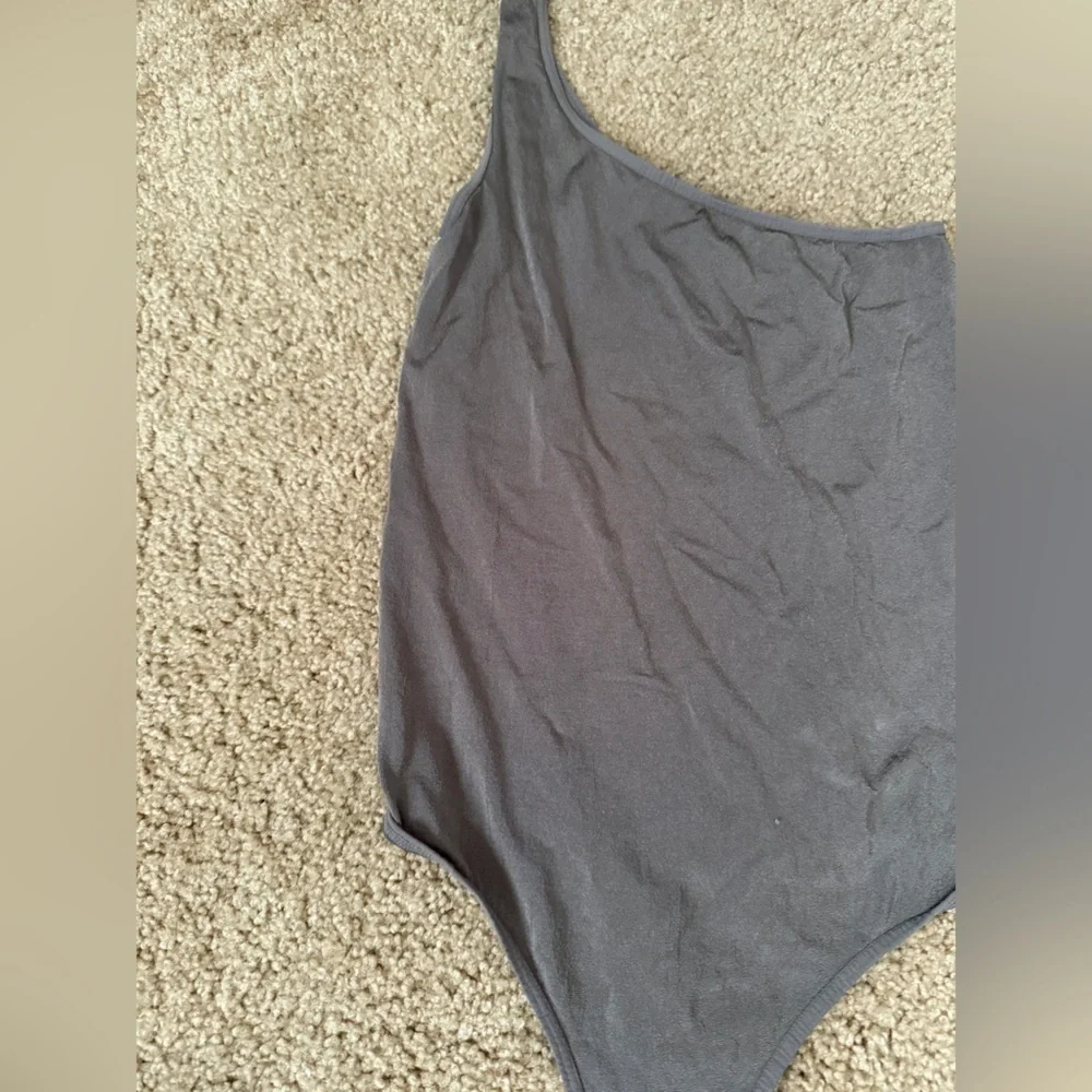 Free People Ribbed Grey One-Shoulder Bodysuit
